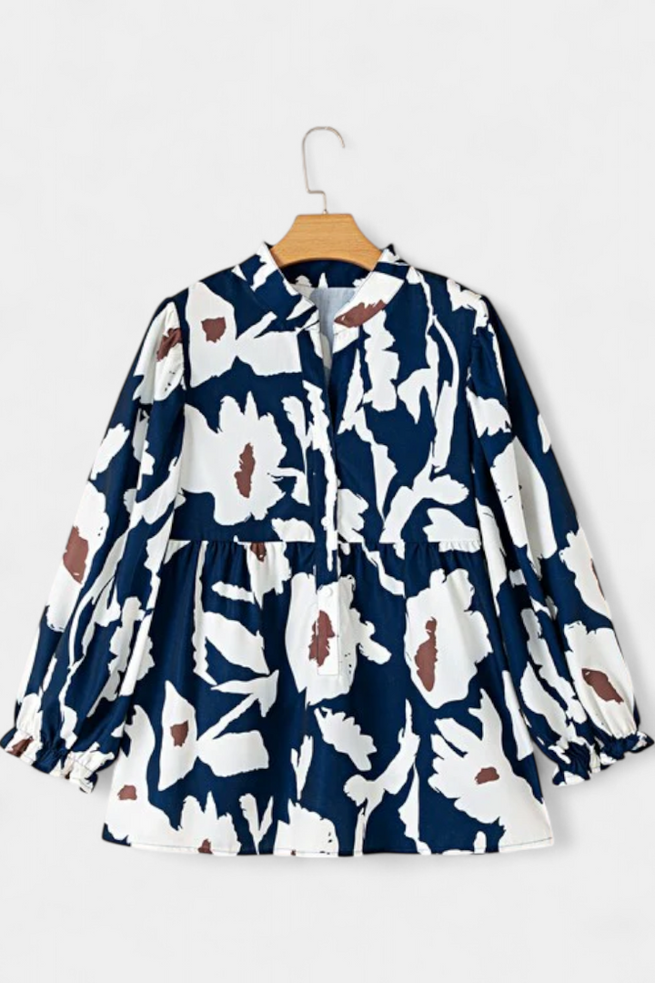 Filomena Blusa con Media Botonadura y Manga Abullonada en Estampado Floral Abstracto